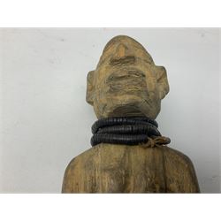 Early 20th century West African Yoruba family wooden figure of Orisha Oko, the god of farming/agriculture, carved from the solid, bears manuscript label of provenance verso H26.5cm