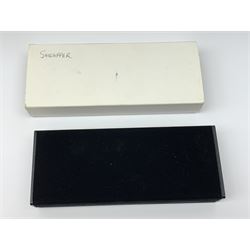 A Sheaffer Imperial Triumph fountain pen, the electroplated body with vertical band decoration, and nib marked 14K 585, together with a further Sheaffer fountain pen, with similarly decorated electroplated body, and nib marked 14K, in unassociated case. 