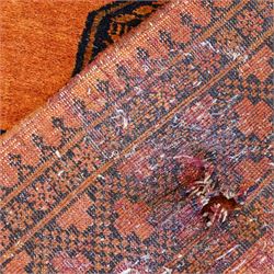 Persian Beluchi indigo ground prayer rug, overall geometric design (147cm x 85cm); together with a Bokhara rust ground rug (146cm x 101cm)