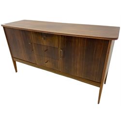 Peter Hayward for Vanson - mid-20th century teak sideboard, rectangular top with rounded corners over three central drawers, flanked by two cupboard doors enclosing shelves, raised on tapered supports