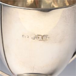 Victorian silver cup with embossed decoration on a plastic base, height of cup 16cm Birmingham 1868 and a small silver challenge cup 'Whitby Show 1950'
