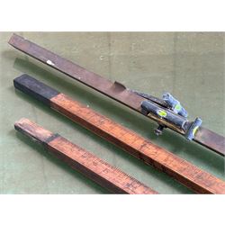 Large two sectional brass mounted treen two sectional surveyors measure, marked for hands ...