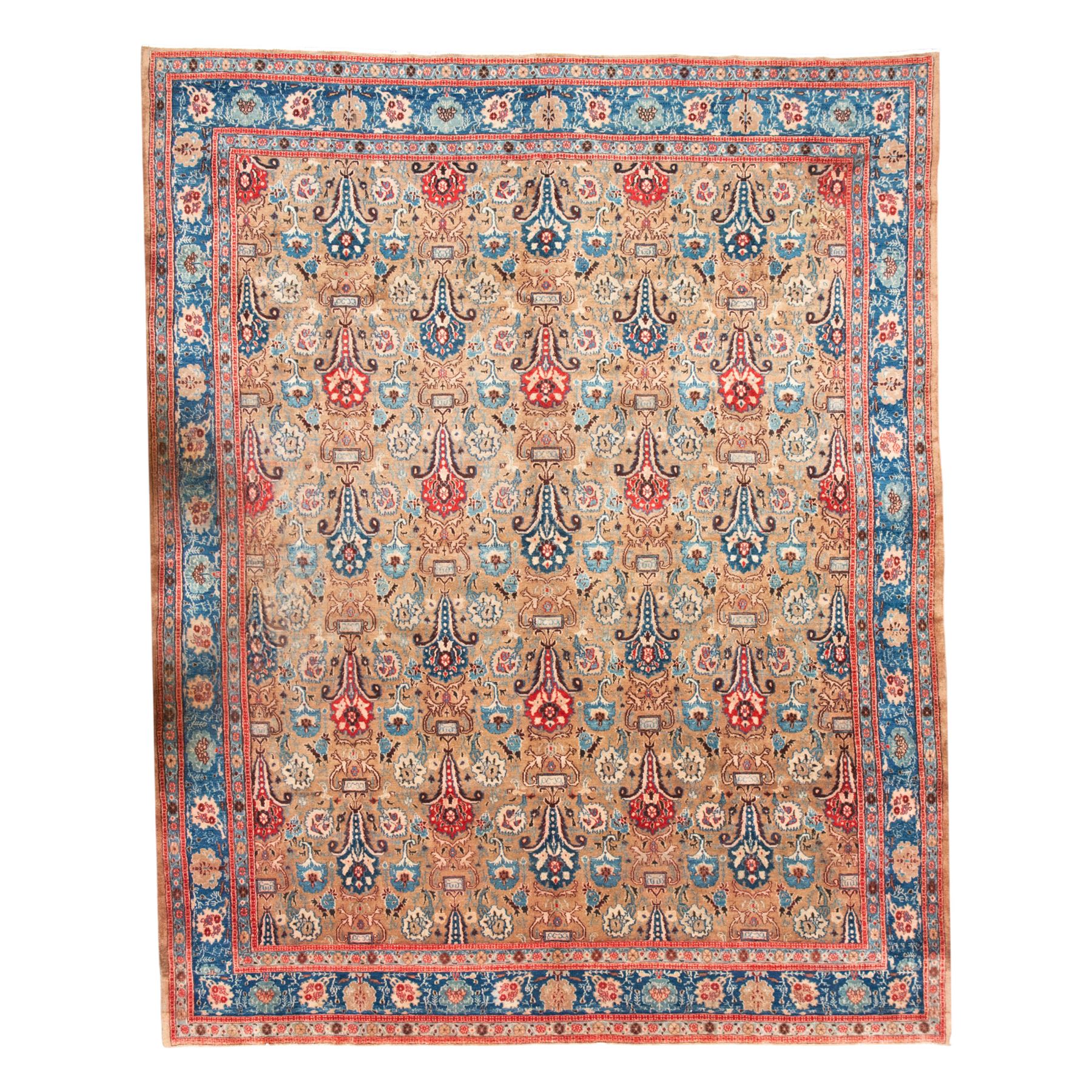 Central-Western Persian Sarouk hand-knotted carpet, beige ground, with an all-over design of boteh and floral sprays in red and blue within a floral border on blue ground 