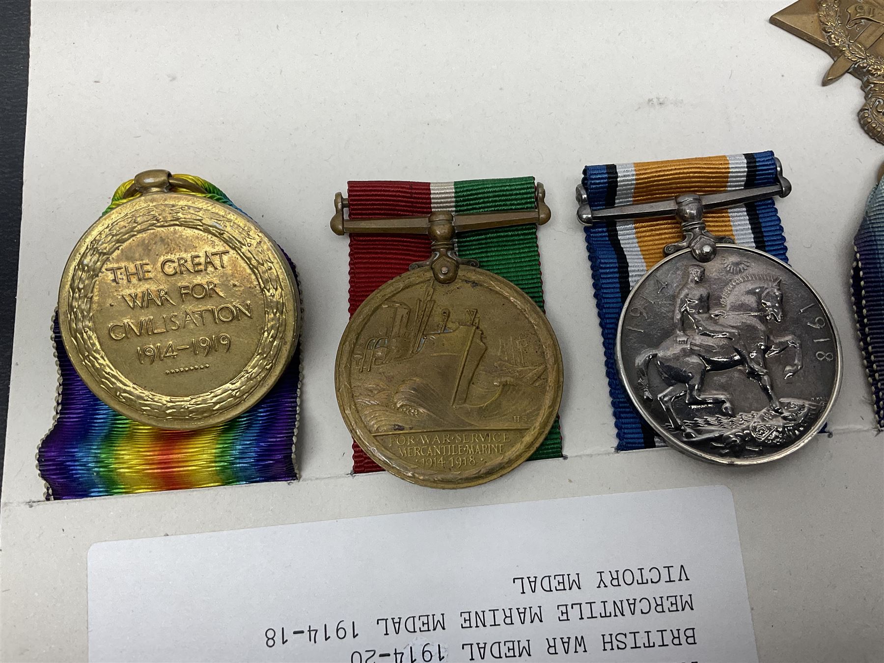 Representative display of five WWI Campaign Stars and Medals to different recipients comprising 1914 'Mons' Star to 13800 Gnr. R. Pexman R.F.A.; 1914-15 Star to TS822 F. Bage T.R. R.N.R.; British War Medal to 90461 Dvr. A.A. Cross R.A.; Mercantile Marine Medal to Patrick J. Magrath; and Victory Medal to 2657 Cpl. W.R. Kenny Norf. Yeo.; all with ribbons (5)