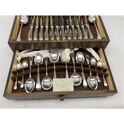 Twelve place setting canteen of cutlery by Lee & Wigfull Ltd, cased in an oak  chest, with key, meat carvers are missing, H18cm, L44cm 