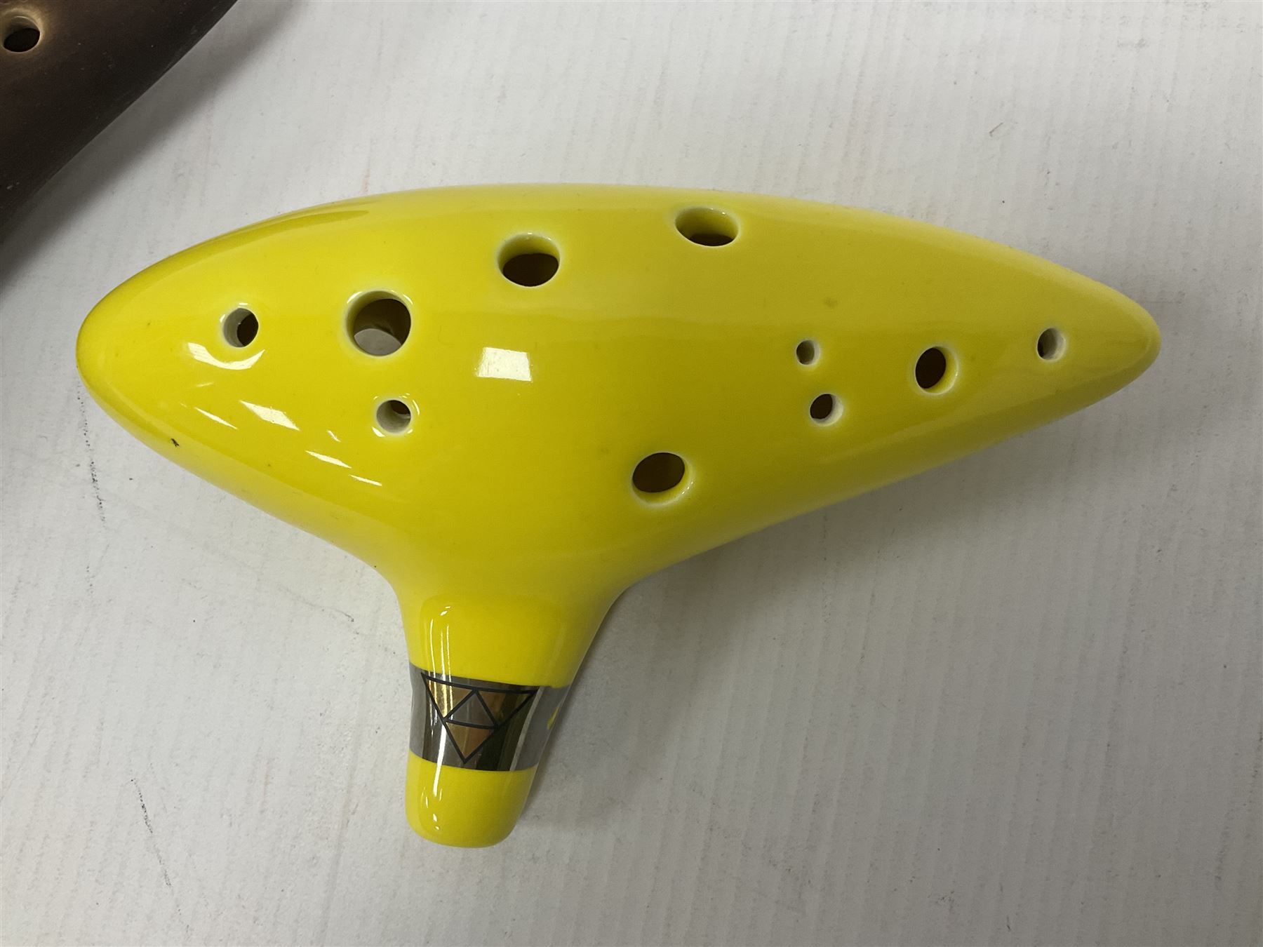 Four ocarinas three 10 hole ocarinas and one 16 hole double ocarina, three of which being from the Legend of Zelda franchise 