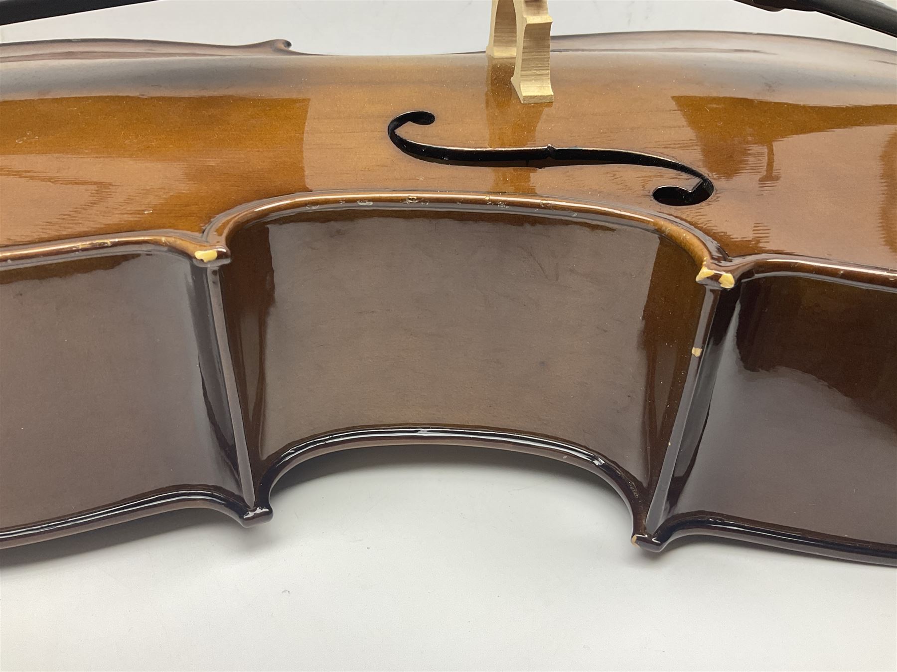 Stentor Student I quarter-size cello with 59.5cm two-piece maple back and ribs and spruce top; bears maker's label with serial no.M076096 L95.5cm overall; in Stentor soft carrying case with bow