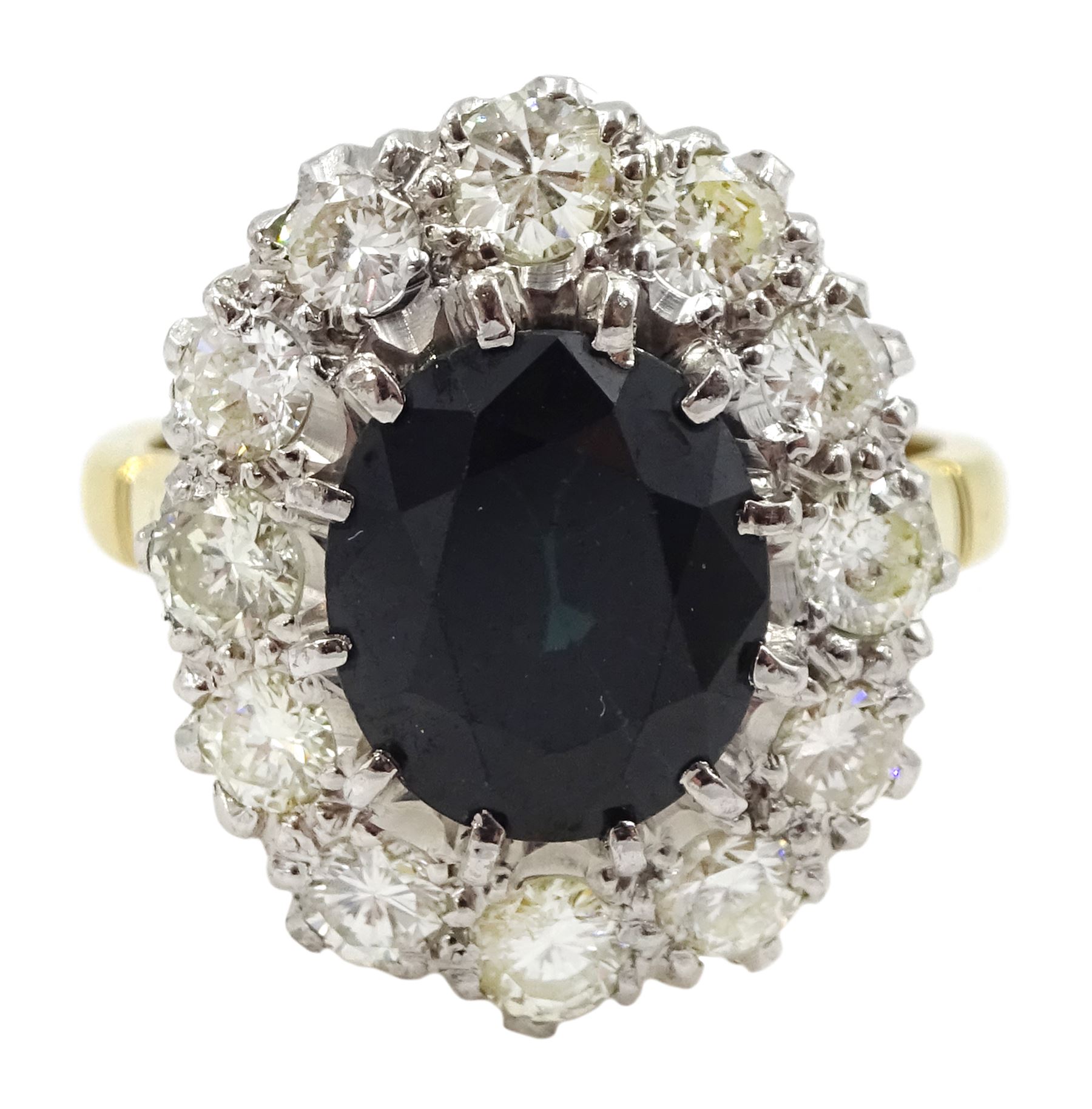 18ct gold and platinum oval sapphire and round brilliant cut diamond cluster ring, stamped, sapphire approx 2.80 carat, total diamond weight approx 1.00 carat and a 9ct gold band, hallmarked