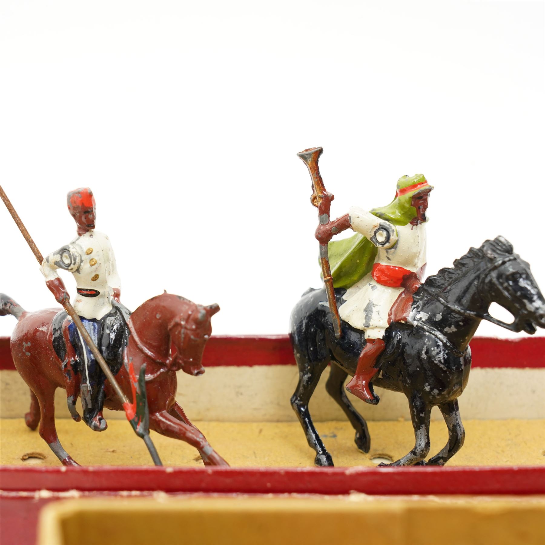 Set of fourteen Johillco lead cavalry on white horses, some with pennants, Britains overseas and colonial foot soldiers and cavalry and a Britains Zouaves box