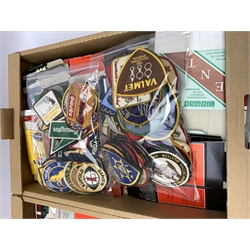 Over ninety predominantly American embroidered cloth badges of shooting interest including rifle clubs and associations, ranges, law enforcement, advertising and promotional etc; and a large quantity of flat-packed cartridge boxes for various makers
