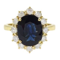18ct gold oval cut sapphire and round brilliant cut diamond cluster ring, hallmarked, sapphire approx 3.30 carat, total diamond weight approx 0.50 carat