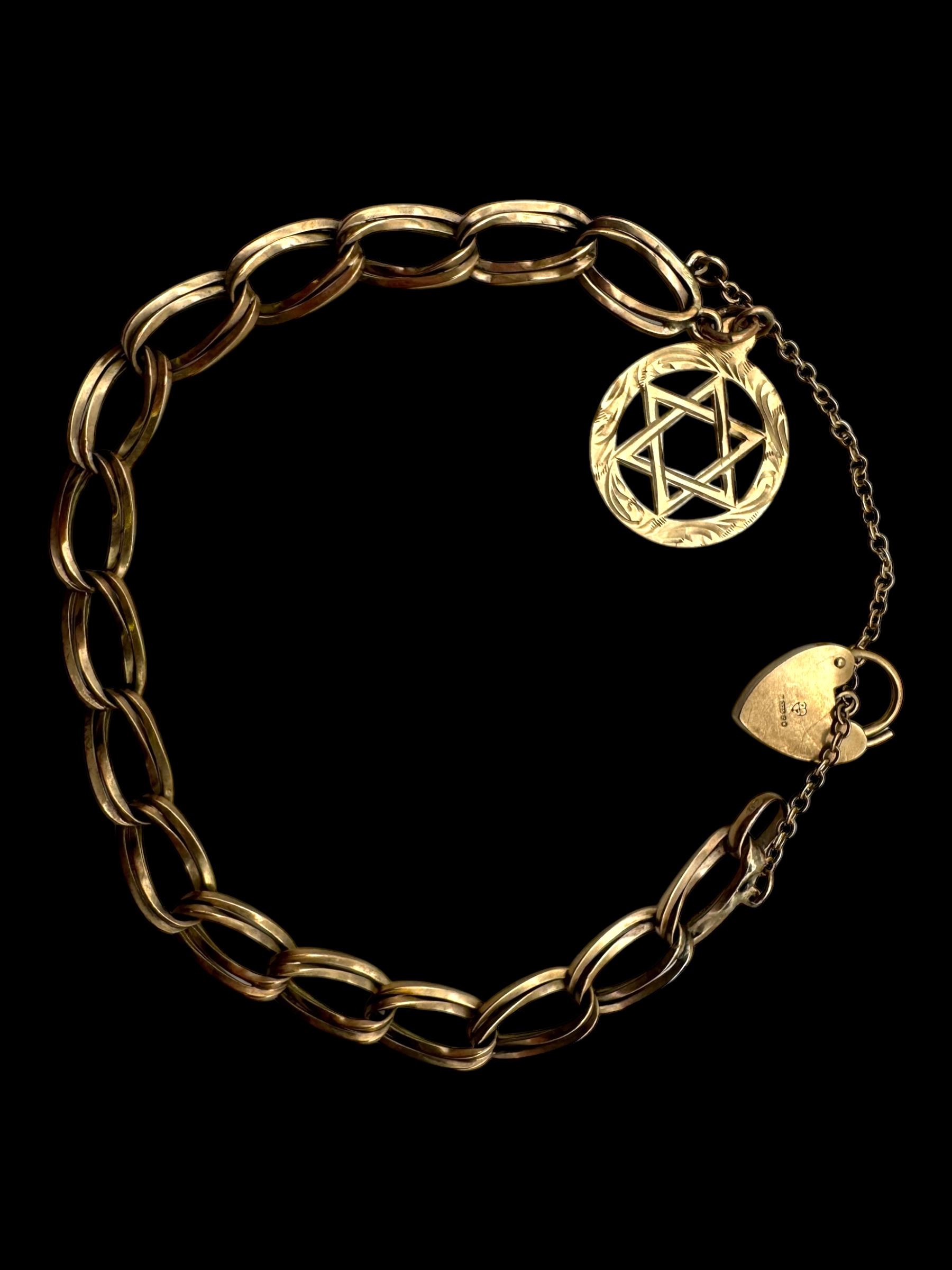 8ct gold bracelet, with 9ct gold heart padlock clasp and a 9ct gold star charm, stamped or hallmarked