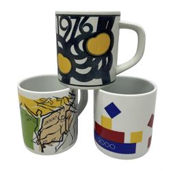 Set of three Royal Copenhagen year mugs, comprising 1976 with silver plaque stamped 925 beneath, and two 2000 examples, H11.5cm