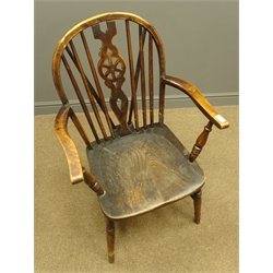  Late 19th century beech armchair, stick and wheel splat back, dished elm seat, W60cm  