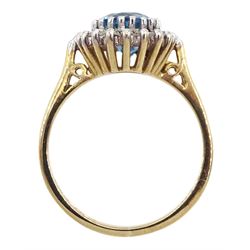 9ct gold diamond and oval blue topaz cluster ring, hallmarked