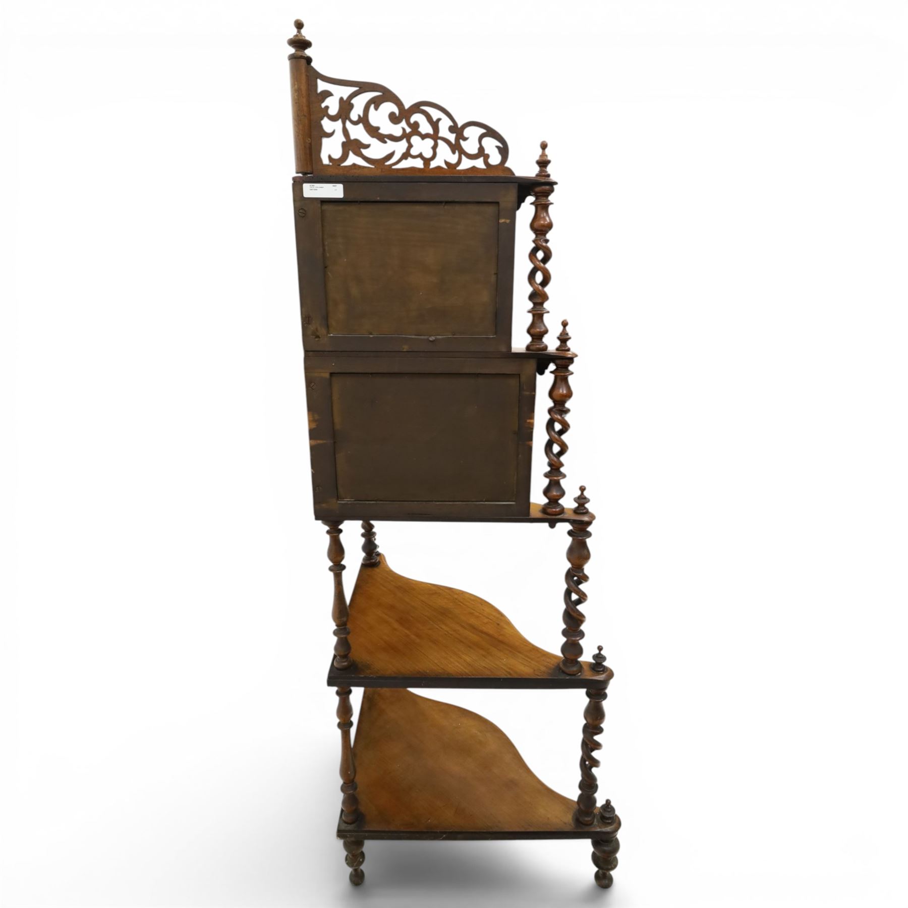 Victorian mahogany five-tier corner whatnot, raised and pierced back of scrolling foliate design, over two tiers with mirror backs and pear-drop moulded aprons, united by pierced spiral-turned uprights, on turned feet