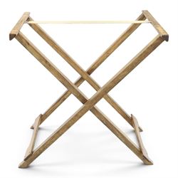 Champagne butler’s tray on stand, the wooden tray printed with champagne bottles and brand names, with cutout handles, raised on a folding stand