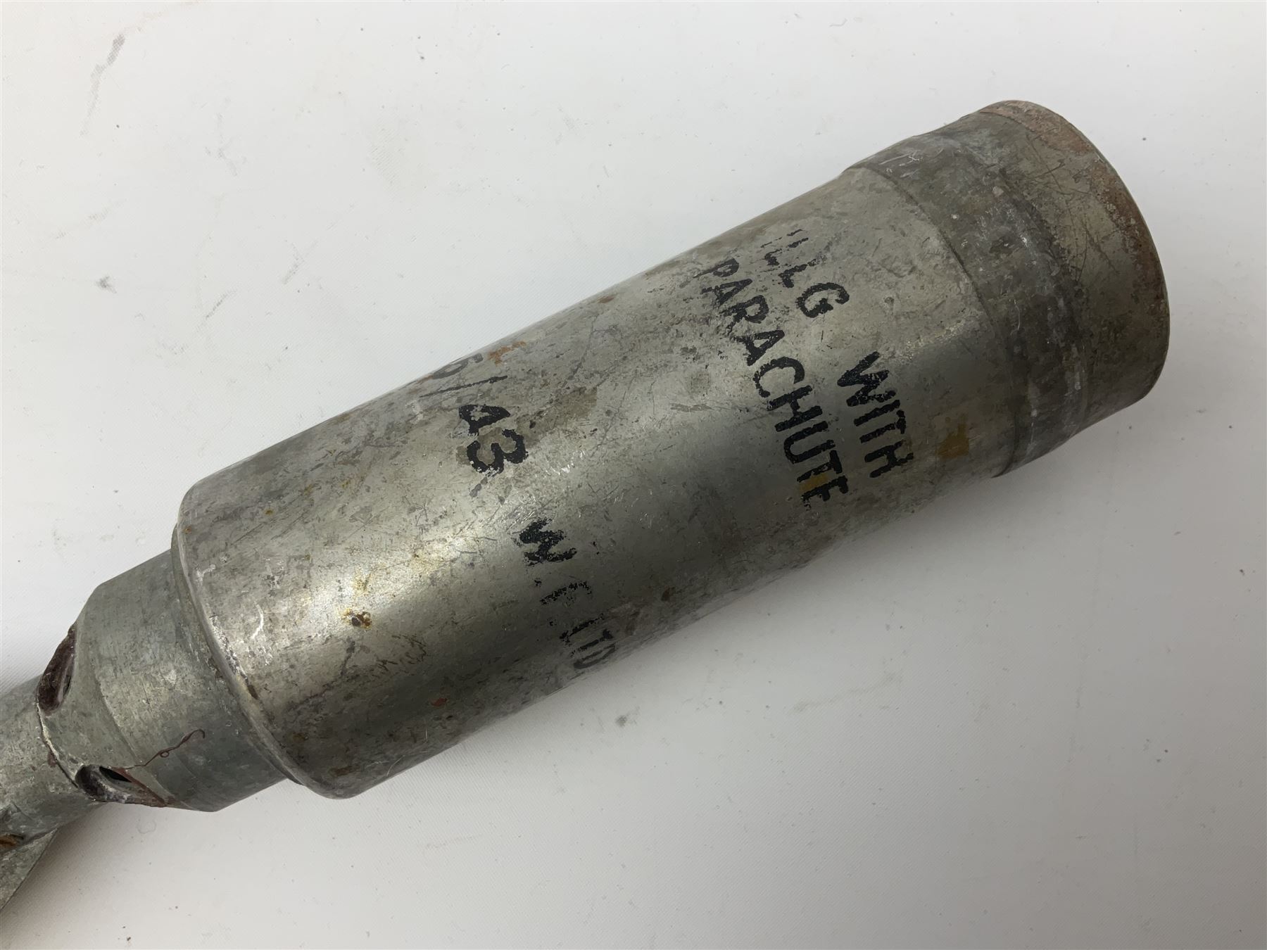Two inert WW2 parachute flare casings, one with parachute and dated 5/43 L24cm (3)