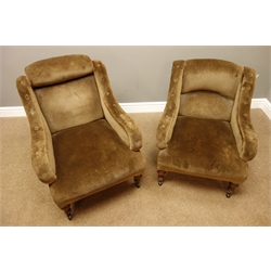  Late Victorian ladies and gent's pair armchairs, walnut framed, down swept scrolled arms, turned feet with ceramic castors, W70cm, D80cm (max)  