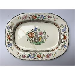 Extensive collection of Copeland Spode dinner and tea wares, decorated in the Chinese Rose pattern, comprising rounded oblong meat plate, sixty plates in five graduated sizes, twenty-five soup plates, five vegetable tureens with four lids, sauce tureen with lid and stand, two twin handles soup bowls (one with stand), sauce boat and stand, nine breakfast cups and ten saucers, two sandwich plates, milk jug, two graduated bowls and three egg cups with four stands, (128)