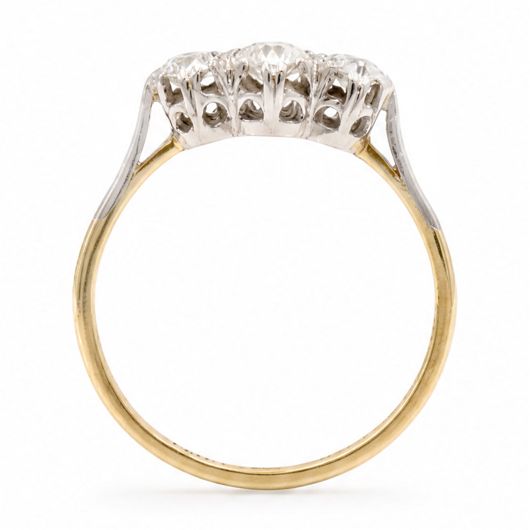 Gold three stone diamond ring, each multi claw set with an old cut diamond, stamped 18ct Plat, total diamond weight approx 0.65 carat