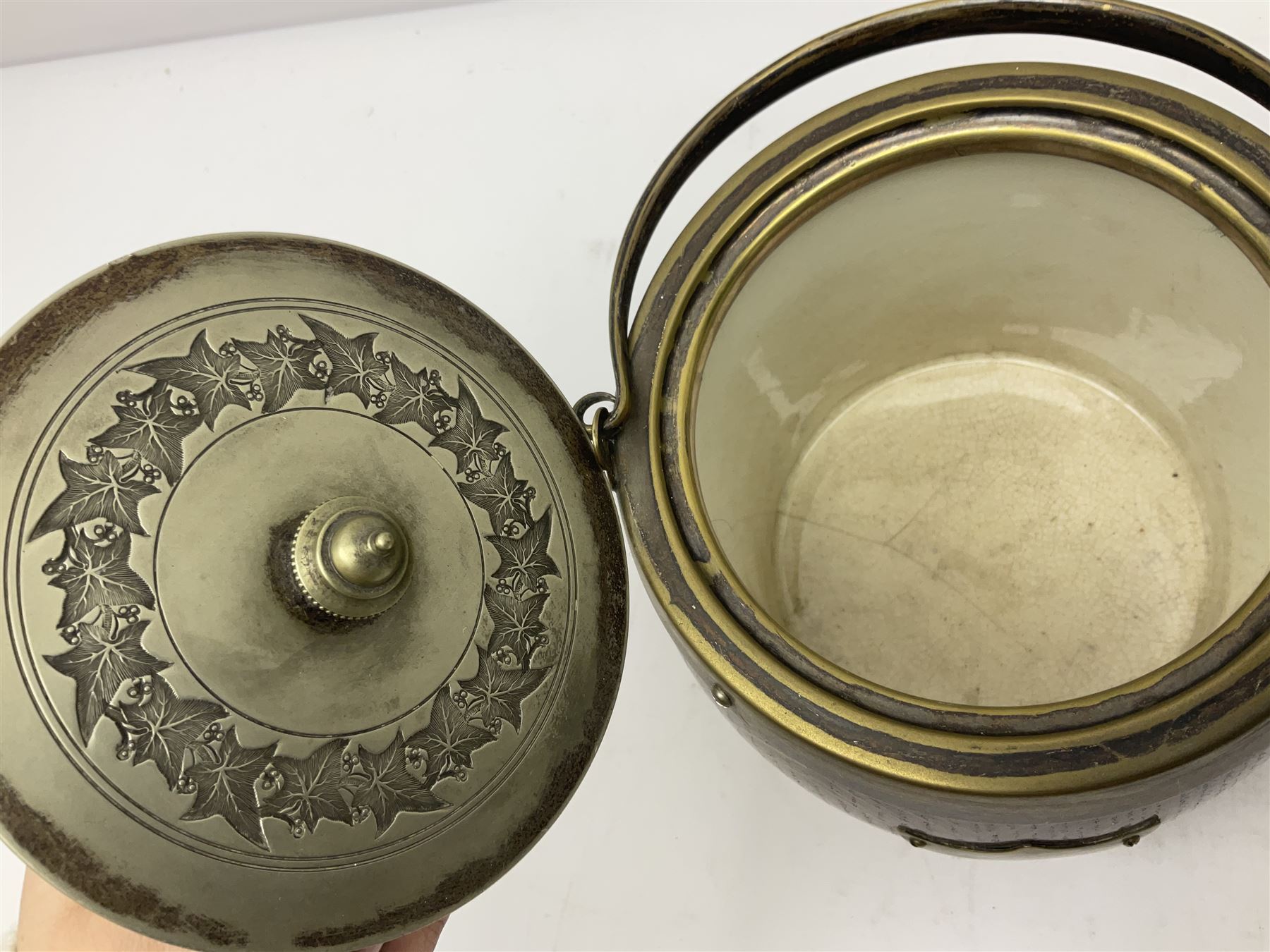 Five early 20th century biscuit barrels with silver-plated mounts