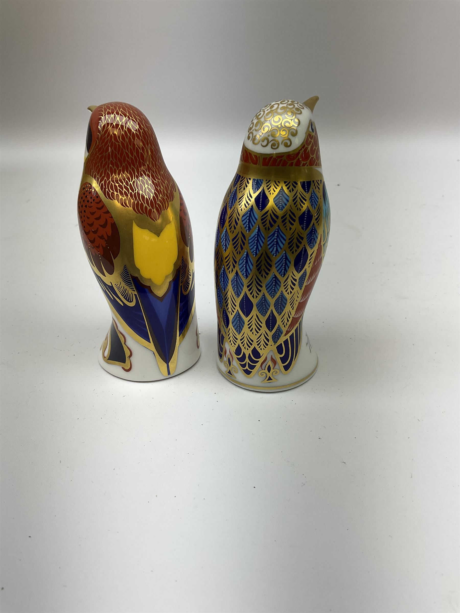 Two Royal Crown Derby paperweights, comprising Beeeater and