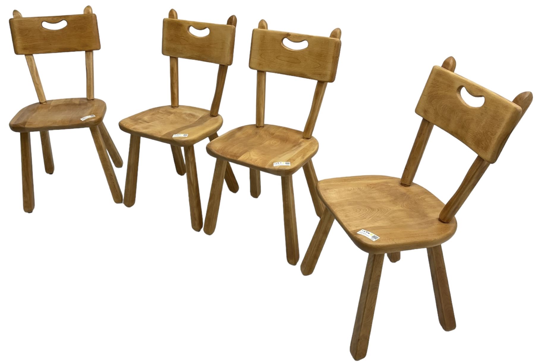 Imperial Canada - set of four mid-20th century birch dining chairs, bar back with pierced handle, dished seat on square tapered splayed supports