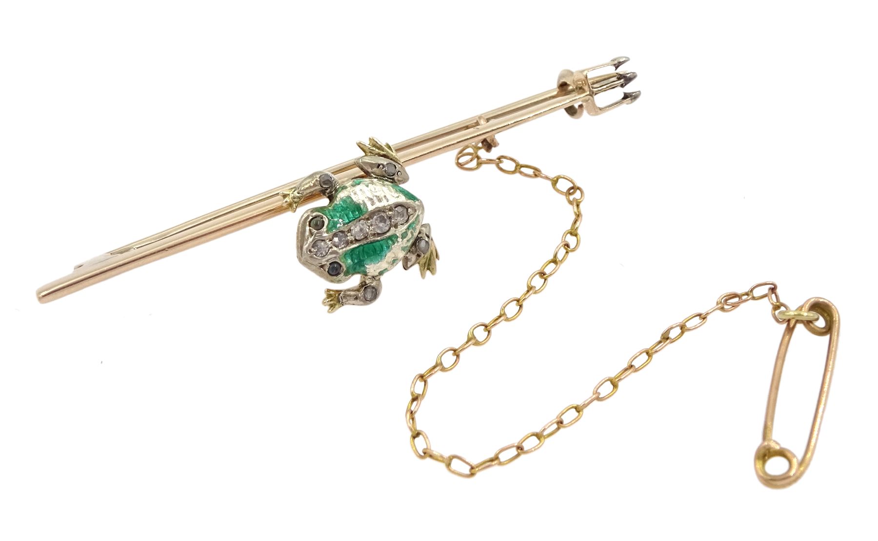 Edwardian frog and spear brooch, the gold and silver green enamel spinning frog set with old cut diamonds and stone set eyes, sat on a gold spear, with registered design number Rd 364025