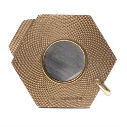 Asprey, 9ct gold hexagonal cigar cutter, hallmarked, with engine turned decoration  
