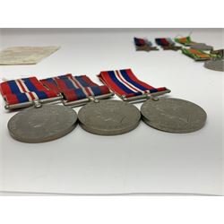 Eleven WW2 medals comprising three 1939-1945 war medals, two Defence medals, three 1939-1945 Stars, Atlantic Star, Africa Star and Italy Star; miniature QEII Naval LS & GC medal; all with ribbons; and WW2 postumous medal slip to Flight Sergeant L.N. Clark