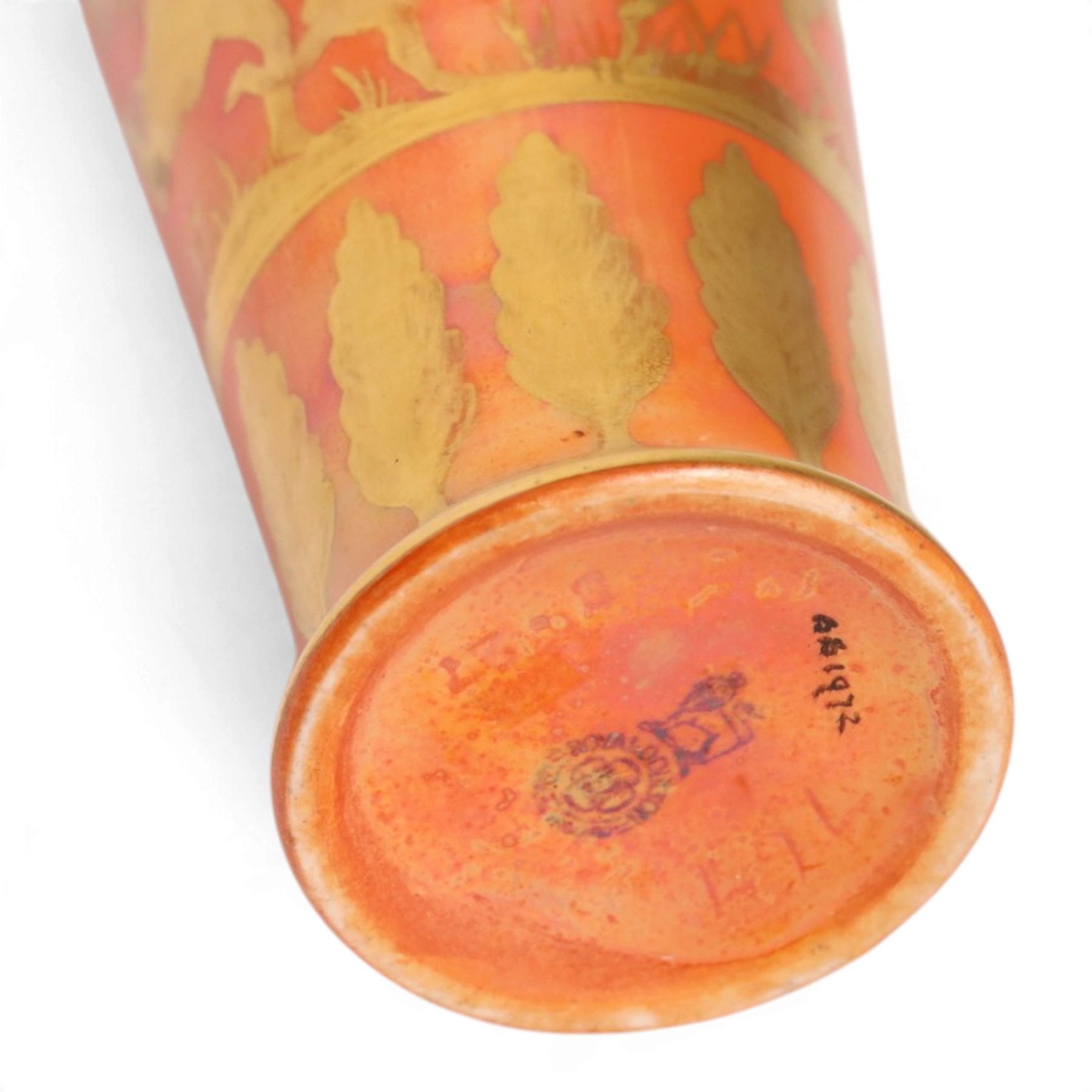 Royal Doulton orange lustre vase, decorated  with gilt figure hunting a stag, above a  boarder of trees, H14cm