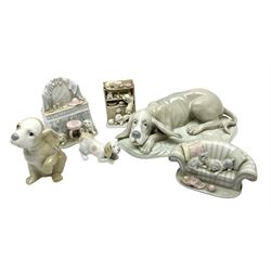 Nao figure of a recumbent dog and a quantity other ceramic dog figures
