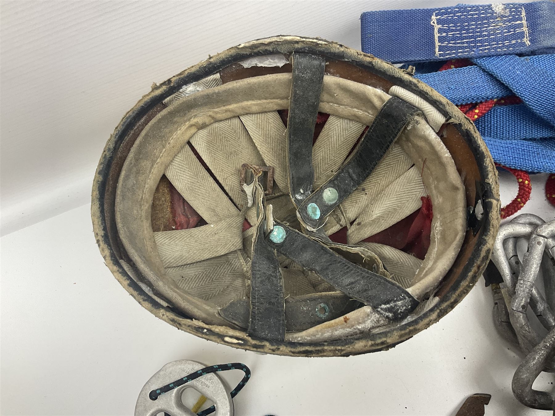 Collection of 1960s/70s climbing equipment including two original Hamish McInnes Pterodactyl ice axes, Joe Brown helmet, carabiners, ropes and wires etc