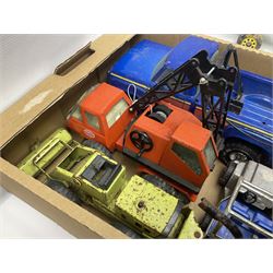 Tonka - fourteen pressed steel vehicles including Pick-up Truck, Tractor Digger, Mobile Crane, Trencher, Beach Buggy, two Bulldozers, Digger, Low Loader, Farm Trucks etc; and small quantity of spare parts (14)