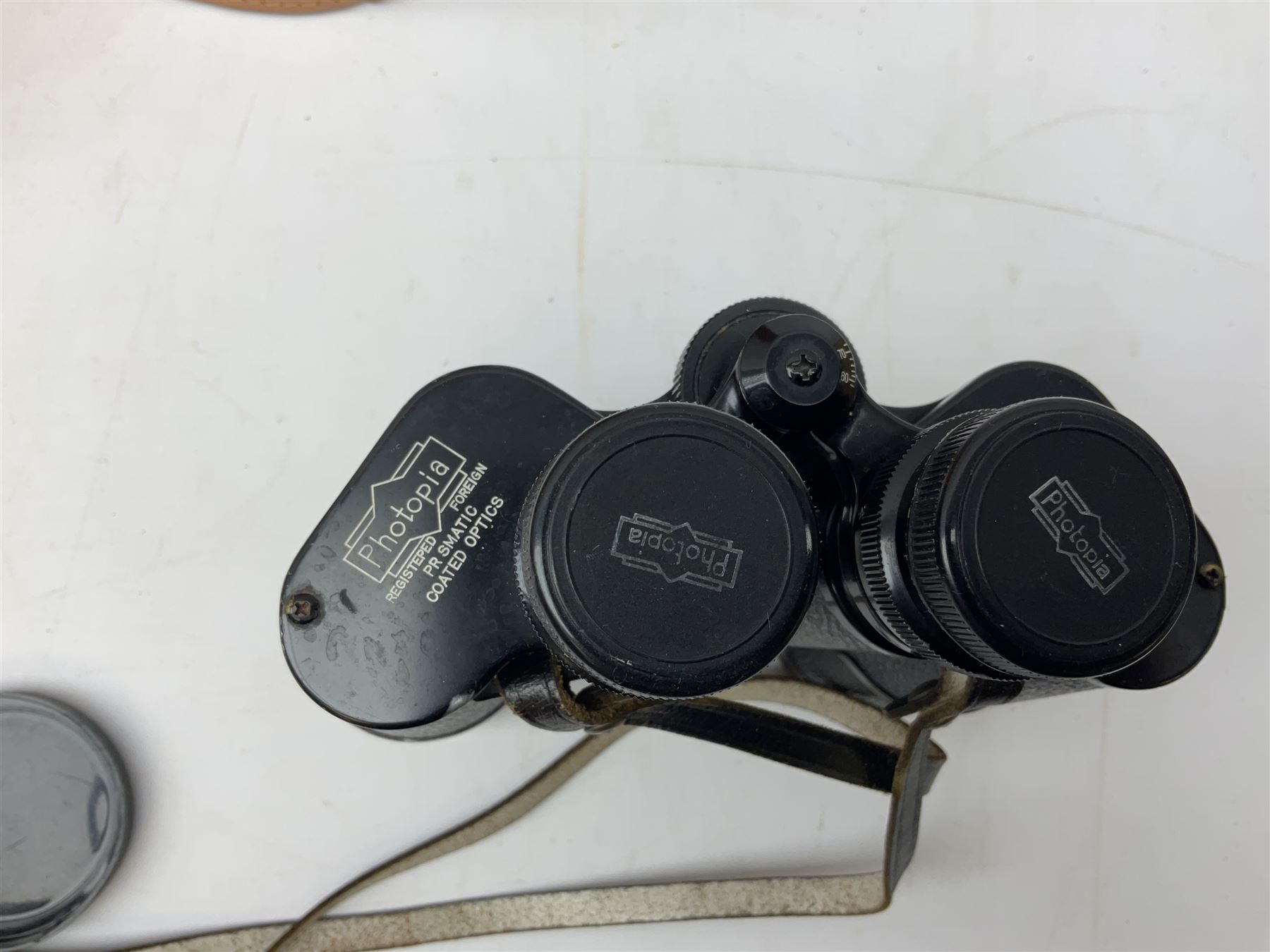 Pair of Rayswi of Harrogate carved oak candlesticks with brass mounts, in the form of an imp, together with a cased pair of Photopia binoculars, mother of pearl opera glasses, Bush radio, oak inkstand etc