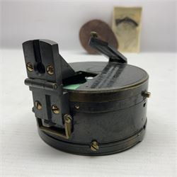 19th century Watkins combined clinometer and compass, patent 217, by J. Hicks Maker 8 Hatton Garden London No.5829, of drum shaped form in lacquered brass case D7cm; both instrument and case bear the name of former owner Thomas S.N. Hardinge; with early 20th century postcard caricature of a serviceman (2)