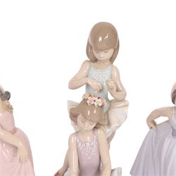Four Lladro figurers, comprising First Ballet 5714, Iris 6276, Rose 6275 and Daisy 6274, all boxed 