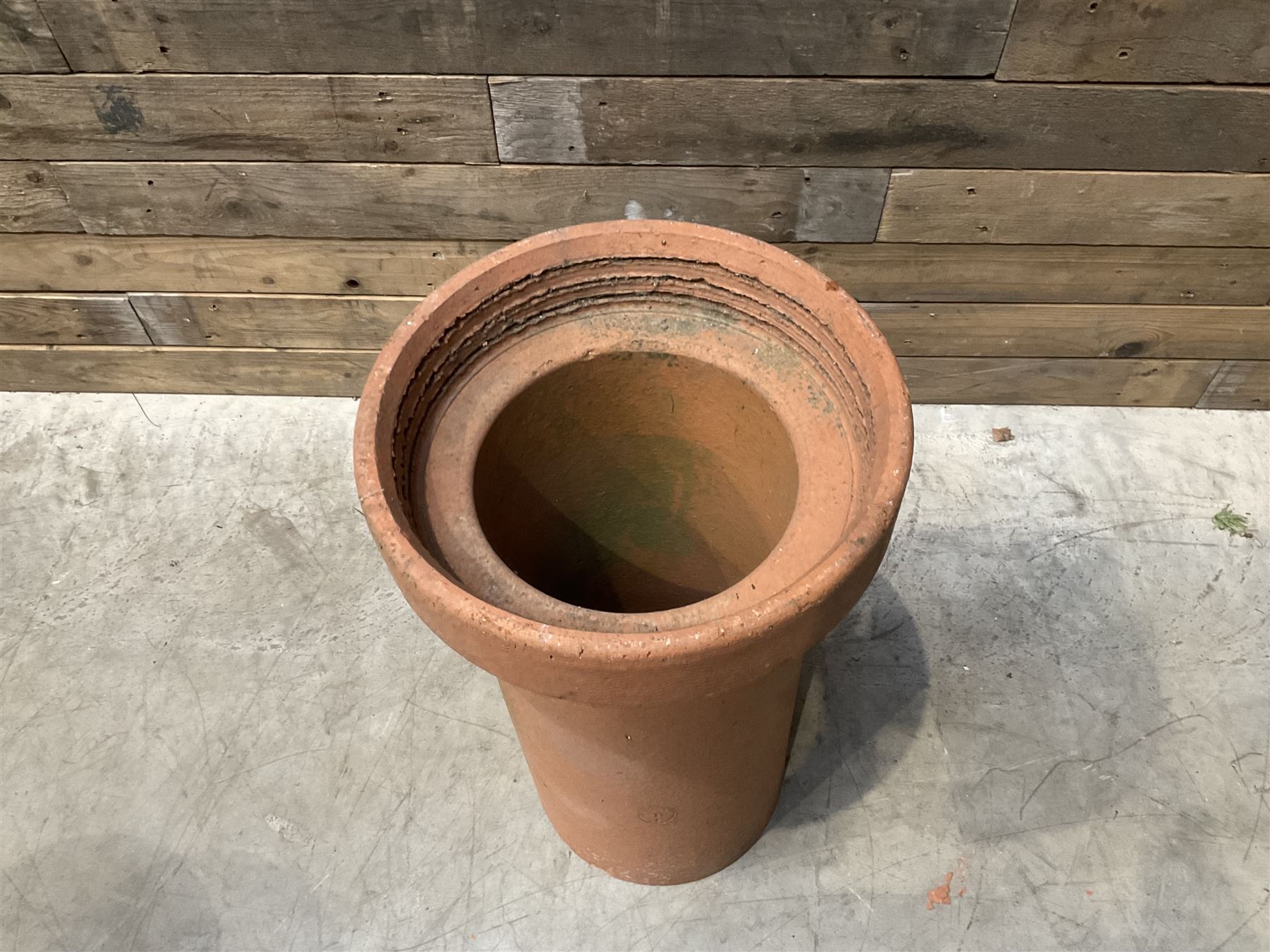 Cast iron cauldron set pot with 2 terracotta chimney pots and 2 terracotta planters,