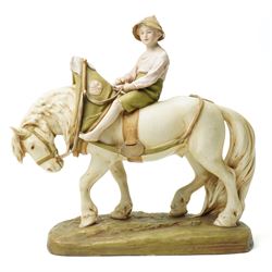 Royal Dux figure of a boy riding a shire horse on naturalistic base model number 1693 L34cm