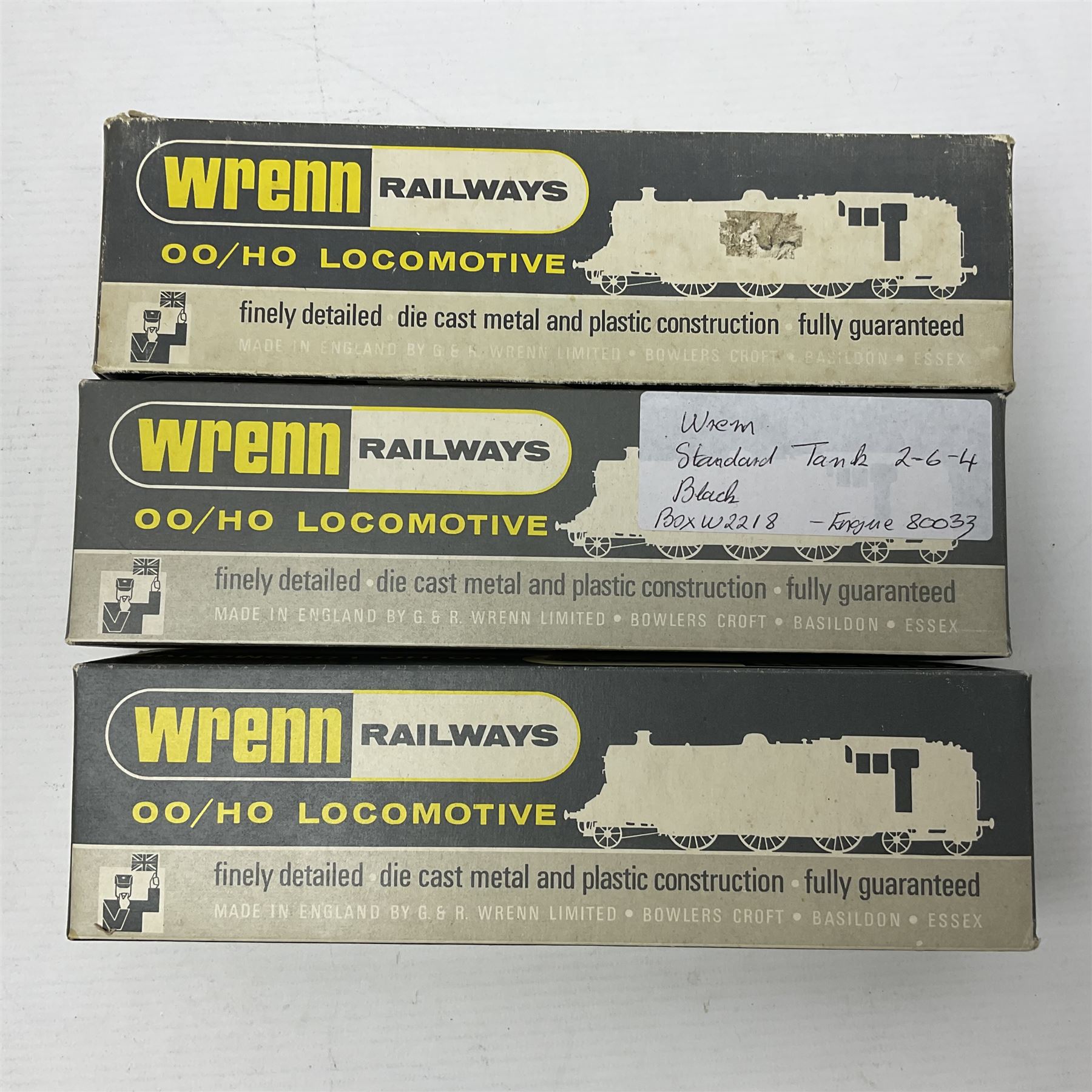 Wrenn '00' gauge - three 4MT Standard 2-6-4 tank locomotives - No.2679 LMS Lined Maroon; boxed with instructions; No.8230 in GWR Green; and No.80033 in BR Lined Black; both in associated Wrenn boxes (3)