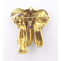  Gold elephant brooch/pendant, diamond set tusks and ruby eyes stamped 14ct  