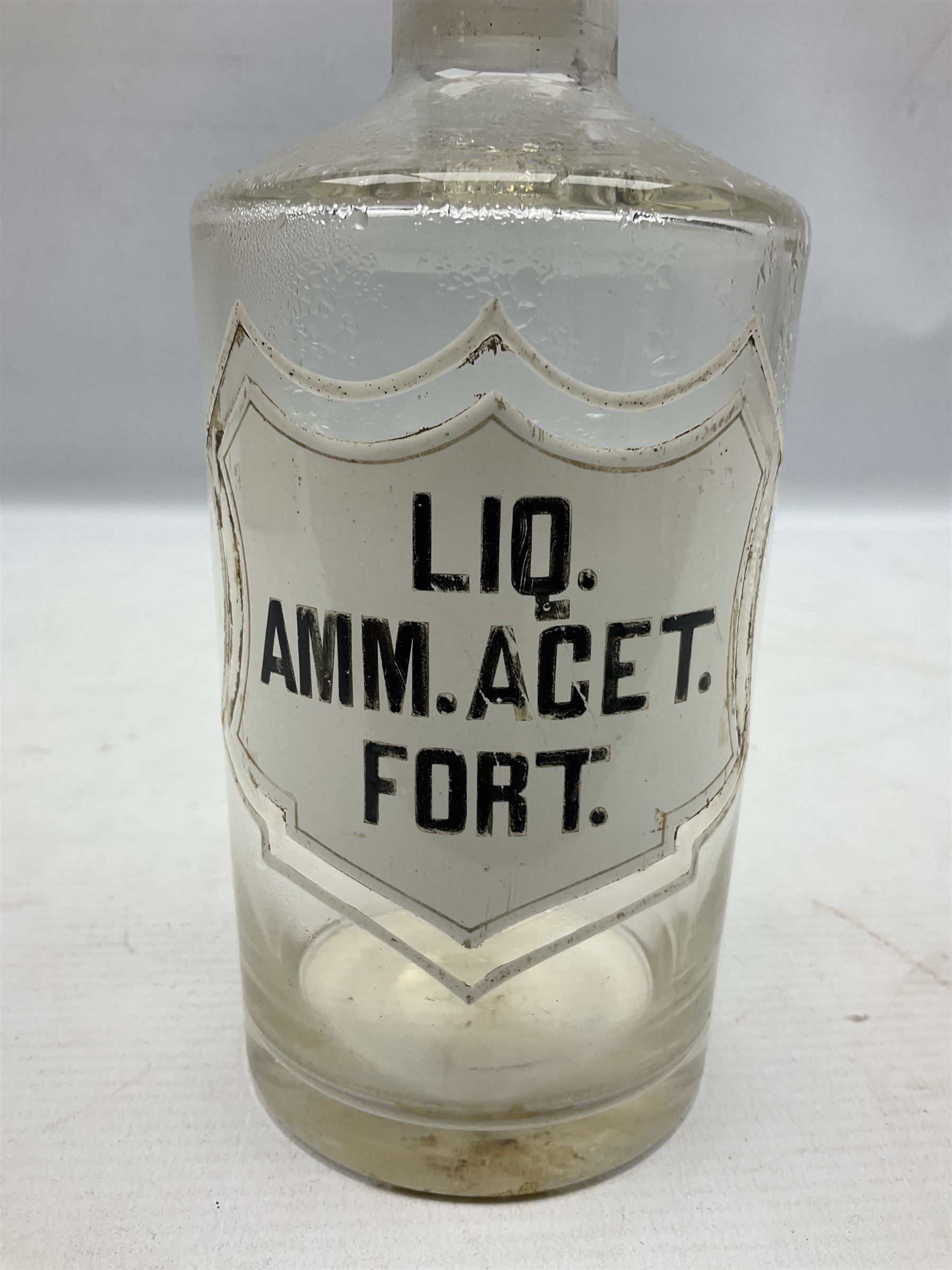 Three Victorian apothecary chemist bottles complete with labels and glass stoppers, H22cm