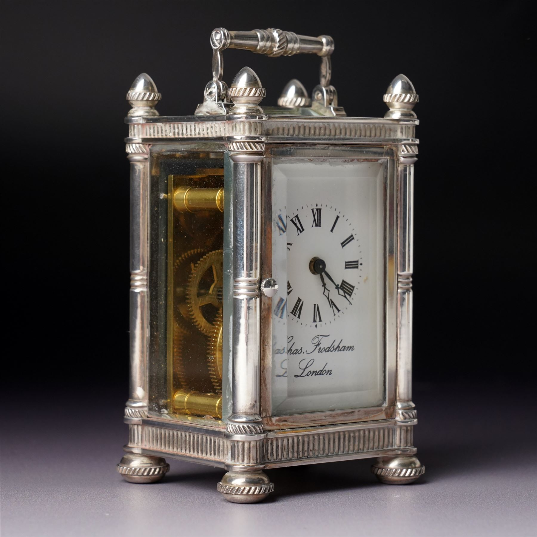 Chas Frodsham, London - Miniature carriage clock with white dial in engraved silver case on compressed bun feet, London assay H10cm 