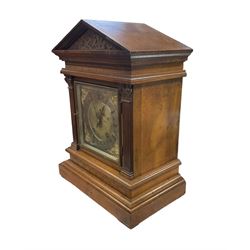 Winterhalder & Hofmeier - late 19th century Mahogany 8-day twin train mantle clock , with an architectural pediment  and carved tympanum, carved reeded pilaster to the front on a stepped plinth with  brickwork relief, square brass dial with cherub spandrels, matted dial centre and silvered chapter ring, dial pinned to a 
