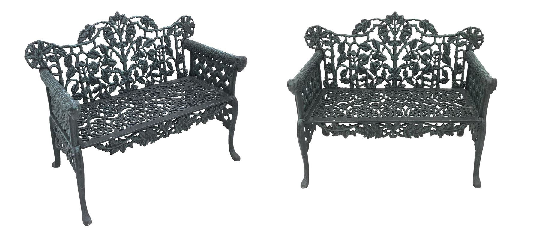 Pair Victorian style cast iron garden benches, ornate interlacing foliage and shaped back, scroll work seat, the leaf moulded arms with rams head terminals, shaped and splayed supports

Location: Duggleby Storage, Scarborough Business Park YO11 3TX