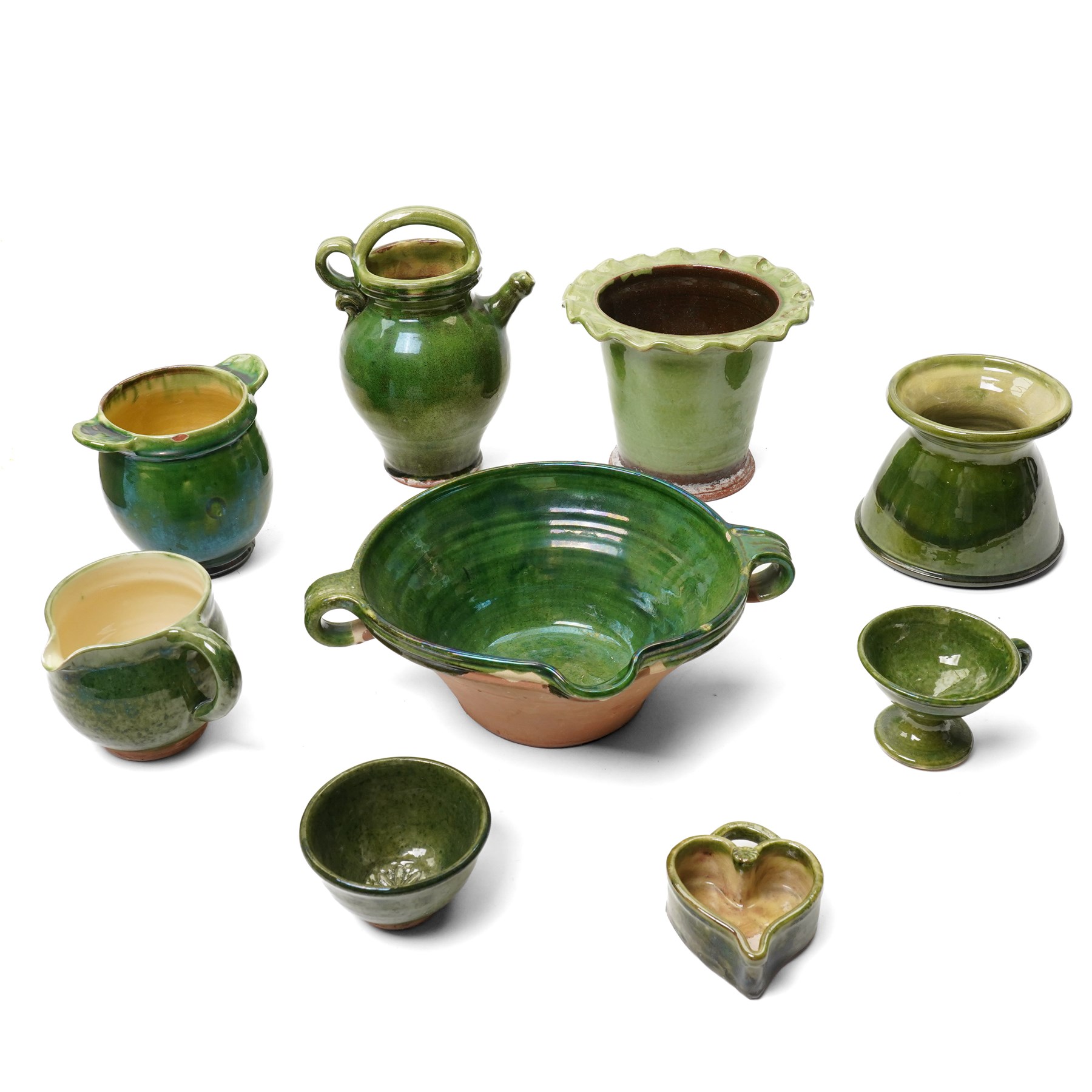 Collection of studio pottery, in green glazes, mostly unmarked, tallest H23cm (7)