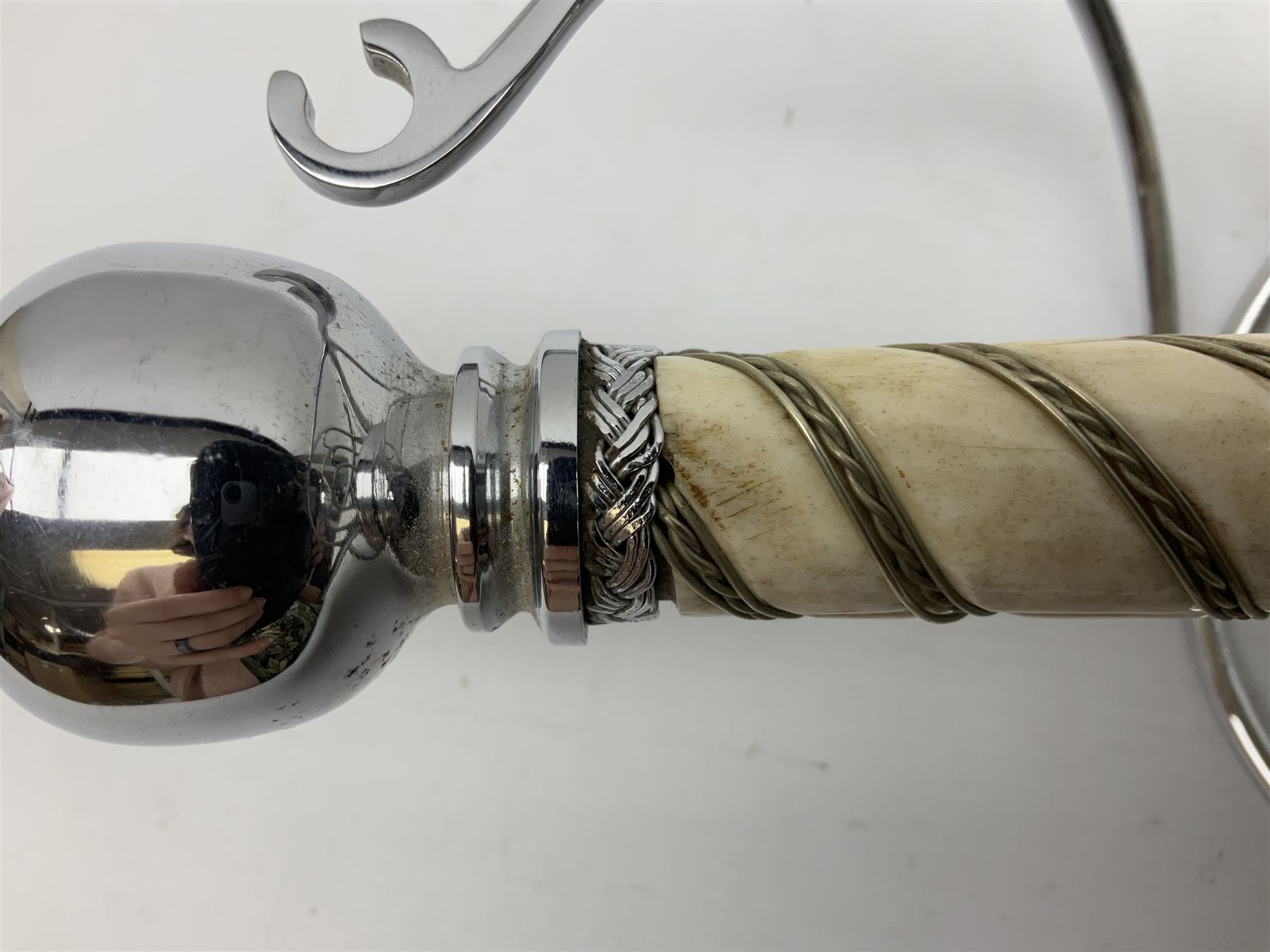 Replica knight's longsword, the 91.5cm double-edged steel blade with basket hilt and wire-bound bone grip with spherical pommel, in leather scabbard L112cm overall