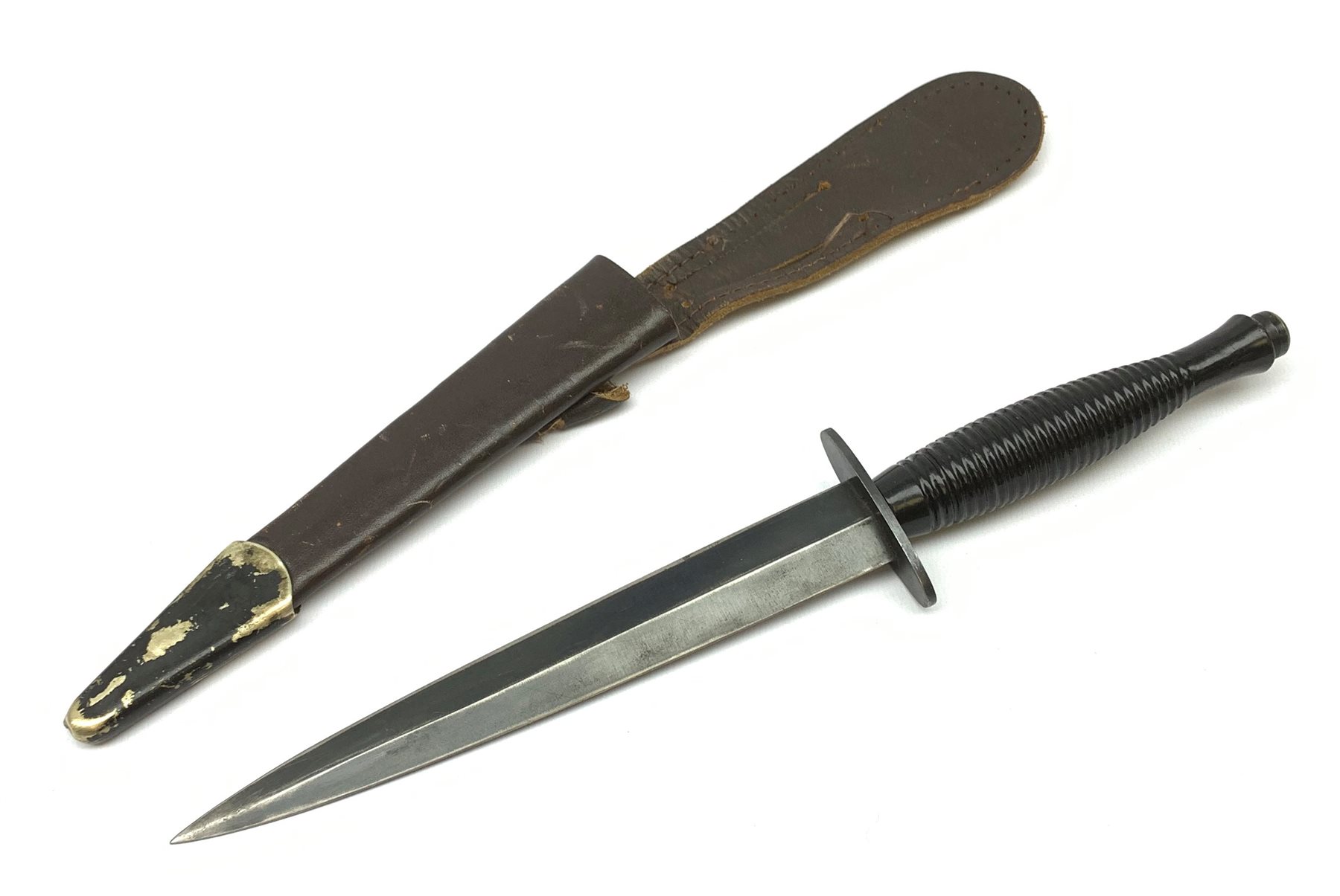 British Fairburn-Sykes style fighting knife, the cross-piece marked Venture H.M. Slater Sheffield L29.5cm, in leather sheath