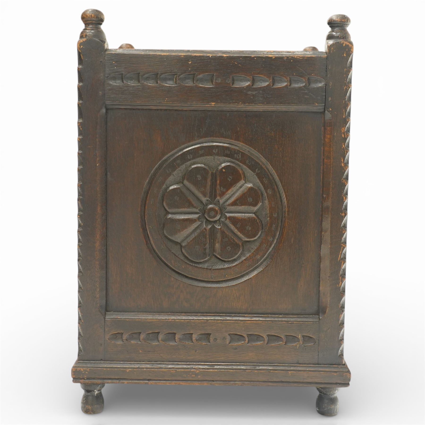 20th century carved fireside accessories; a carved coal bucket with metal liner and a carved fire screen